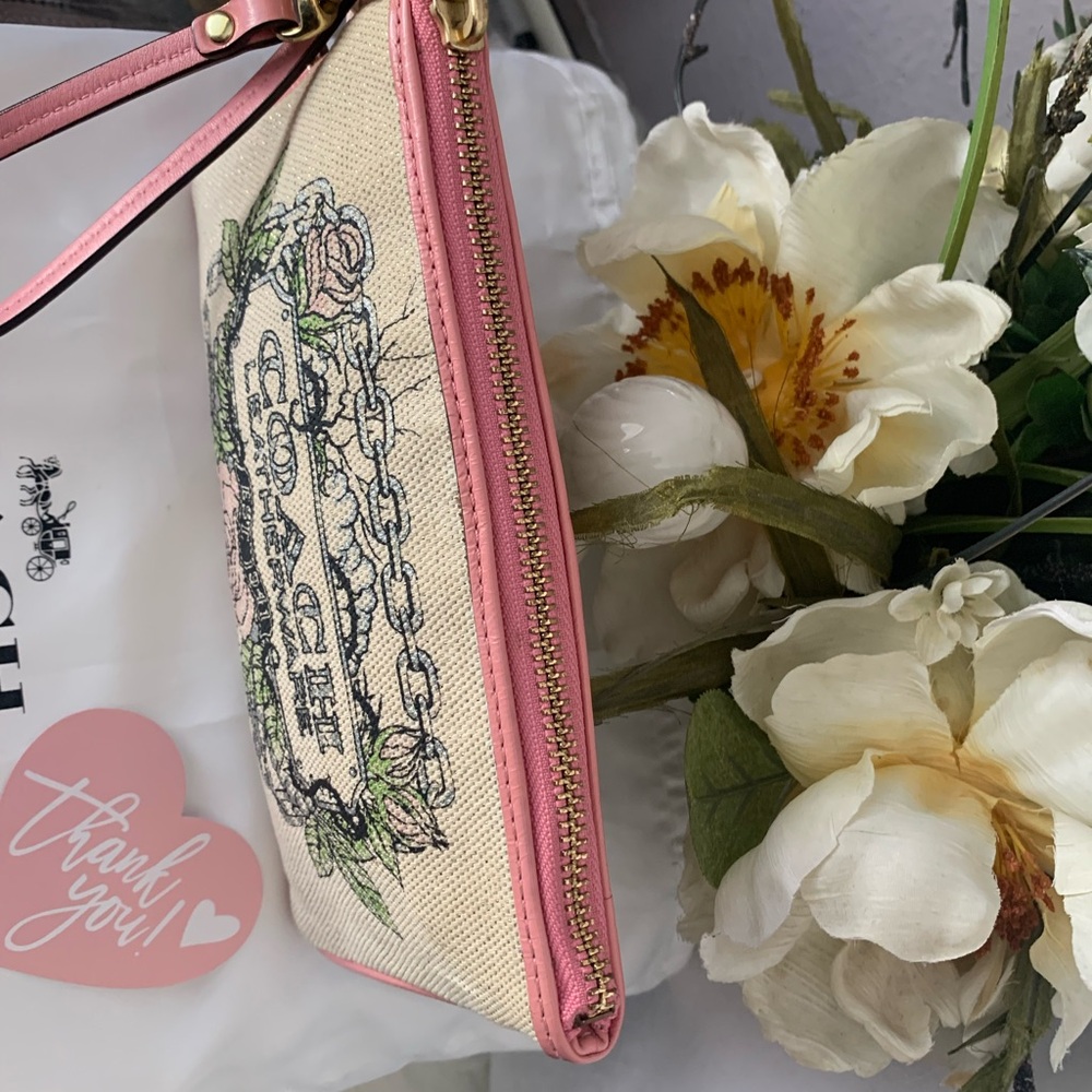Limited Edition Coach Floral Canvas Wristlet Leather Trim and Bow
Charm - Picture 8 of 9
